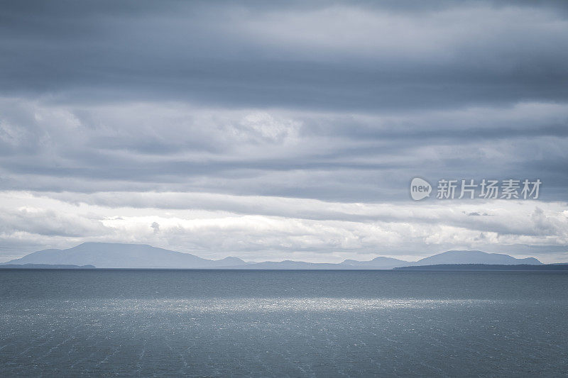 Moody Cloudscape Over The Ocean